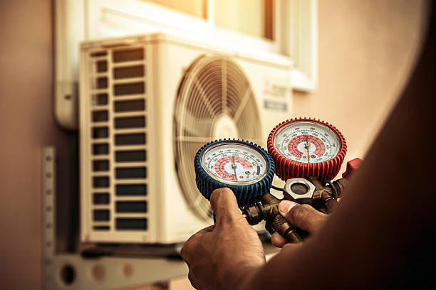 Professional Heat Pump Repair technician working in Selkirk, NY